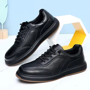 Close-up shot highlighting the premium pebbled leather grain of these black casual shoes