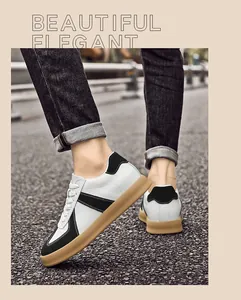 Retro GAT sneakers voor heren met wit leer en bruine rubberen zool detail