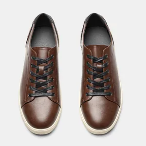 Top view of men's brown vintage casual sneakers with black laces