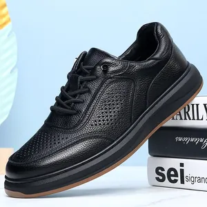 Black genuine cowhide leather casual sneakers with perforated design for men