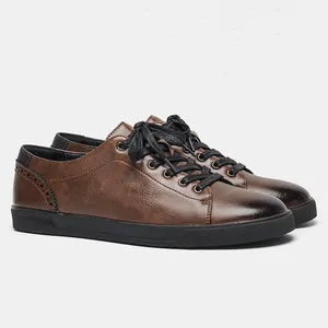 Vintage distressed brown casual shoes for men with black rubber soles and laces