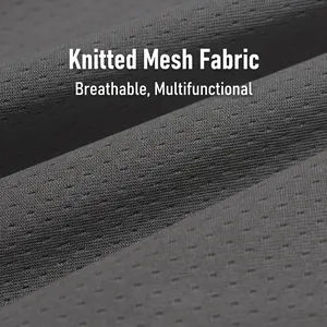 Detalle en primer plano del tejido de malla gris transpirable para pantalones deportivos