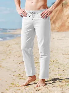 Vista completa de pantalones de playa de lino blanco con cordón para hombre