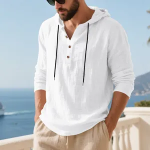 Detailed view of white linen long sleeve hooded t-shirt with henley neck and black drawstring.