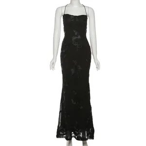 Elegant black floral lace dress detail showing slim silhouette and fine textures