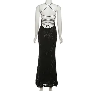 Elegant black backless lace-up maxi dress with intricate floral embroidery details