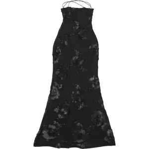 Elegant black floor-length dress with floral embroidery and sexy backless design detail.