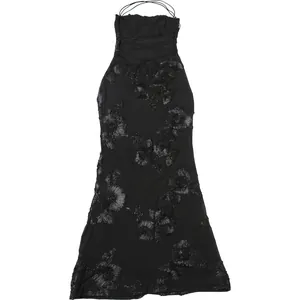 Elegant black backless maxi dress with textured floral embroidery and delicate halter straps