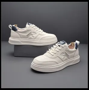 Stylish white leather casual sneakers for men with navy blue accents and YRREEY logo