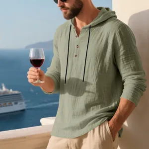 Close-up detail of a breathable men's linen hooded Henley shirt perfect for beach vacations