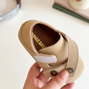 Toddler khaki suede Birkenstock style walking shoes with velcro strap and metal button detail