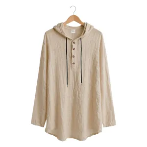 Detail view of men's beige linen hooded long sleeve henley t-shirt on a hanger