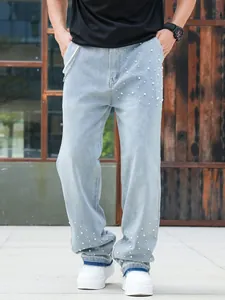 Men's loose straight denim jeans featuring decorative white pearl bead embellishments