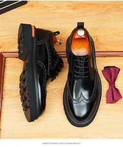 Premium black patent leather Brogue Derby shoes with thick soles and wingtip design