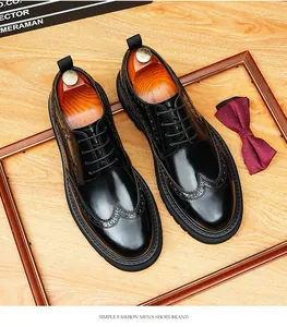 Premium polished black leather wingtip Derby shoes for men with round toe and thick sole