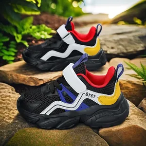 Breathable boys mesh sports sneakers with chunky anti-slip soles and vibrant color-blocking design