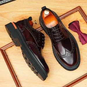 Vintage men's burgundy leather brogue shoes with thick soles and round toe
