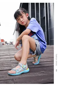 Girl's summer sandals with colorful checkered straps and butterfly detail