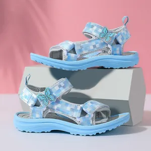 Light blue girl's sandals with butterfly decor and checkered straps for summer beach wear