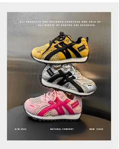 Detailed stack of breathable mesh children's sneakers in yellow, silver, and pink variants