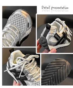 Detailed views of silver mesh kids sneakers showing toe, heel, laces, and sole texture