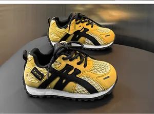 Breathable yellow mesh children's sneakers with comfortable chunky sole for sports
