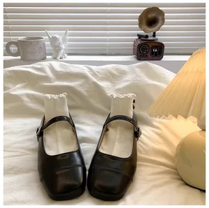 Elegant black Mary Jane shoes for girls with soft soles and white ruffle trim socks