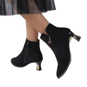 Elegant black suede pointed toe ankle boots with kitten heels and a stylish side zipper.