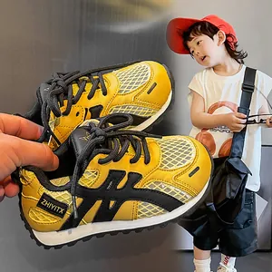 Stylish yellow breathable mesh sneakers for kids featuring a durable thick dad shoe sole