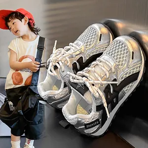 Breathable silver mesh sneakers for kids featuring metallic finish and lightweight design