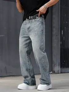 Jean droit large pour homme avec motifs complexes d'étoiles en strass et perles en bleu