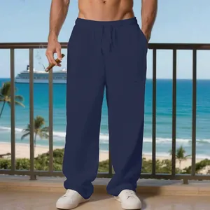 Pantaloni casual da uomo in lino blu navy con coulisse e vista panoramica sul mare