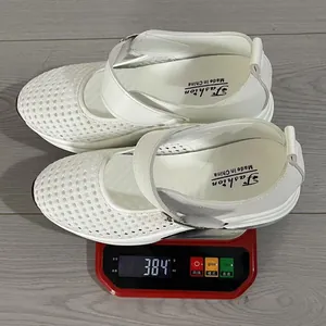 Detailed view of lightweight white breathable wedge sandals weighing 384g