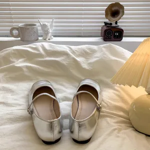 Elegant silver Mary Jane shoes for girls with soft sole in a cozy lifestyle setting