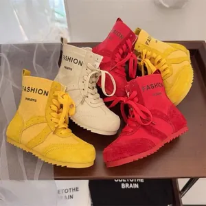Stylische Mode-Stiefeletten aus Canvas für Kinder in kräftigem Rot, Gelb und Beige