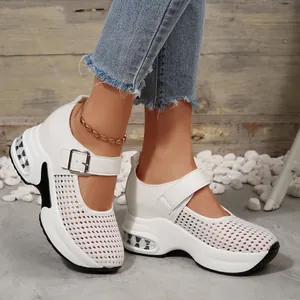 White breathable mesh platform sneakers for women with stylish wedge sole detail