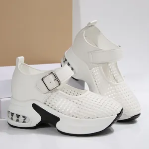 Detailed view of white breathable mesh platform sandals with wedge heels and buckle strap.