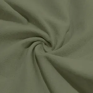 Vista ravvicinata dettagliata della trama del tessuto in lino verde salvia premium
