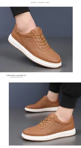 Détail de baskets en cuir véritable marron pour hommes avec design perforé respirant
