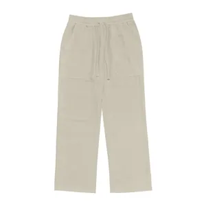 Vista dettagliata dei pantaloni casual da uomo in lino beige con coulisse e gamba larga