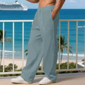 Pantaloni casual da uomo in lino con coulisse e gamba larga in riva al mare
