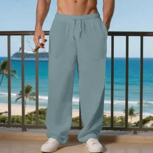 Vista dettagliata dei pantaloni casual in lino da uomo con coulisse e tasche