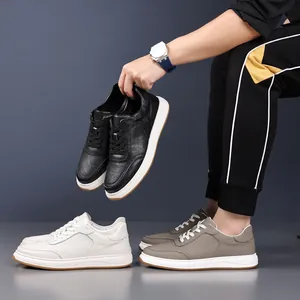Premium cowhide leather men's casual sneakers shown in black, white, and grey colors