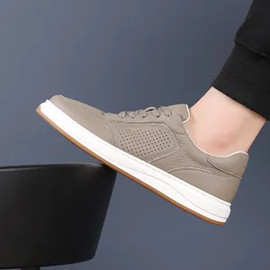 Breathable genuine leather men's sneakers in khaki with perforated side details