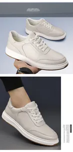 Gros plan de baskets en cuir grainé beige pour hommes montrant la texture et le style