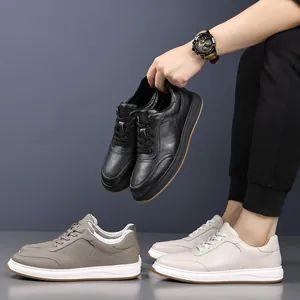 Chaussures d'hiver chaudes en cuir véritable pour hommes avec semelles blanches