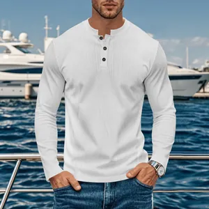 Men's white ribbed long-sleeve Henley shirt in an outdoor yacht club setting.