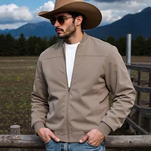 Vue détaillée d'un blouson bomber en daim pour homme au style cowboy occidental robuste