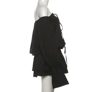 Side view of sexy off-shoulder black dress featuring bell sleeves and lace-up details