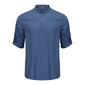 Men's solid blue Henley shirt featuring a stand collar and button detail in cotton fabric